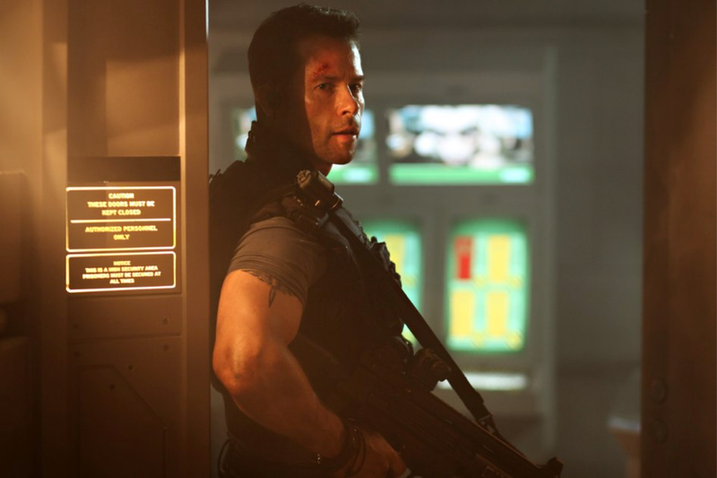 Illustration for article titled New Lockout stills show off the sexy side of the "space prison" movie